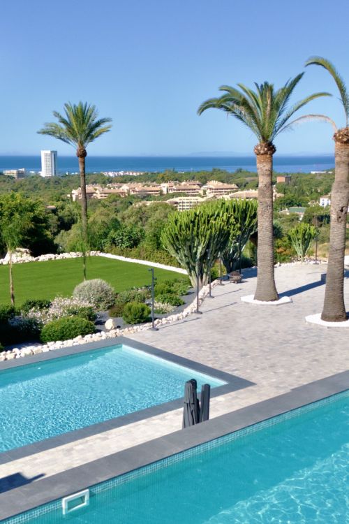 Luxury sea-view villa with development potential for sale in Elviria, Marbella East