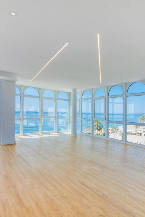 Stunning, south-facing fully renovated, three bedroom beachfront apartment in the heart of Estepona’s charming Old Town