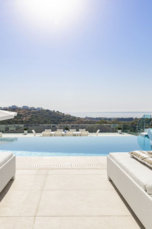 Modern Mediterranean Haven with Infinity Pool & Impressive Panoramic Views