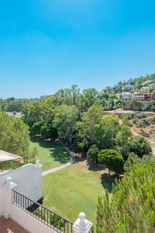 Verlengt west-georiënteerde adosada huis in La Quinta Golf, op een steenworp afstand van het Club House