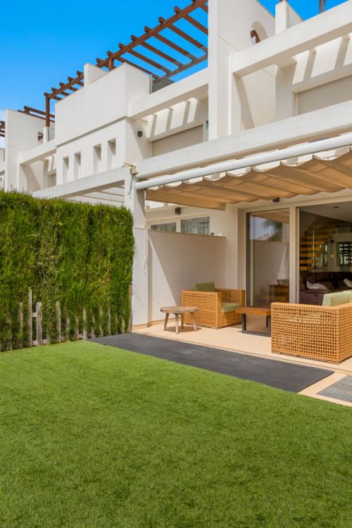 Stunning four-bedroom townhouse located in the gated community of El Romeral de Calahonda, Mijas Costa