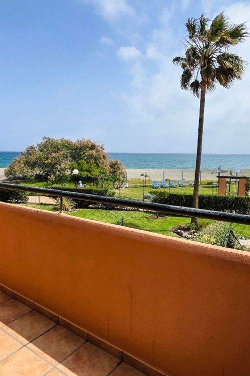Frontline Beach Townhouse with Private Garden and Panoramic Sea Views in Manilva Beach