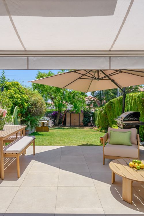 Beautifully reformed three-bedroom townhouse with a private garden in Nueva Atalya